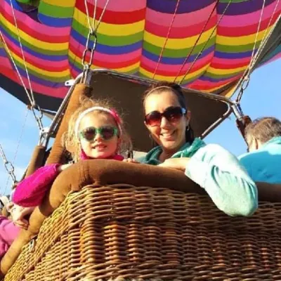 A woman and a child in a hot air balloon